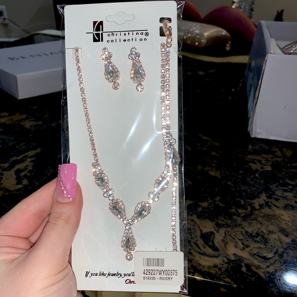 bracelet , necklace, and earrings. brand new